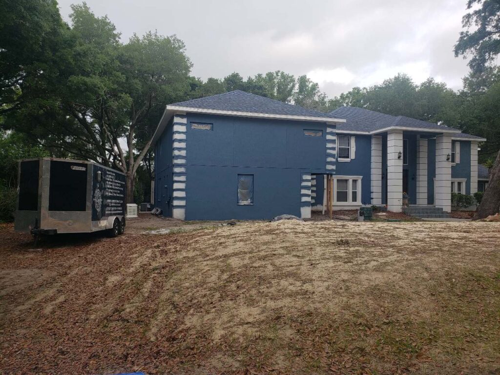 RestoreEZ team performing water restoration in a Tampa Bay home